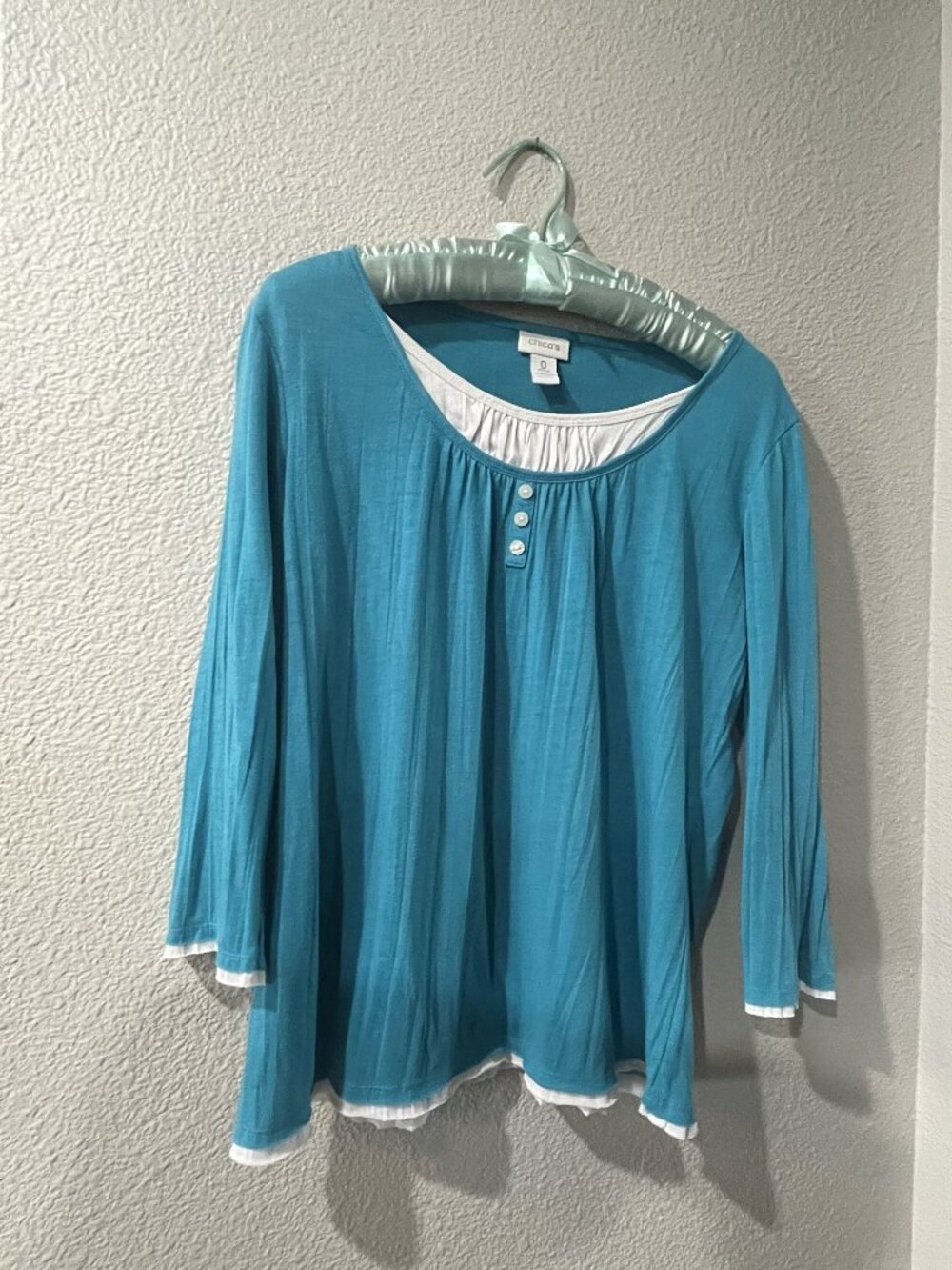 Chico's aqua top.  Single top looks like 2!
